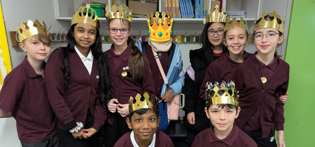 Children wearing crowns for French Epiphany celebration